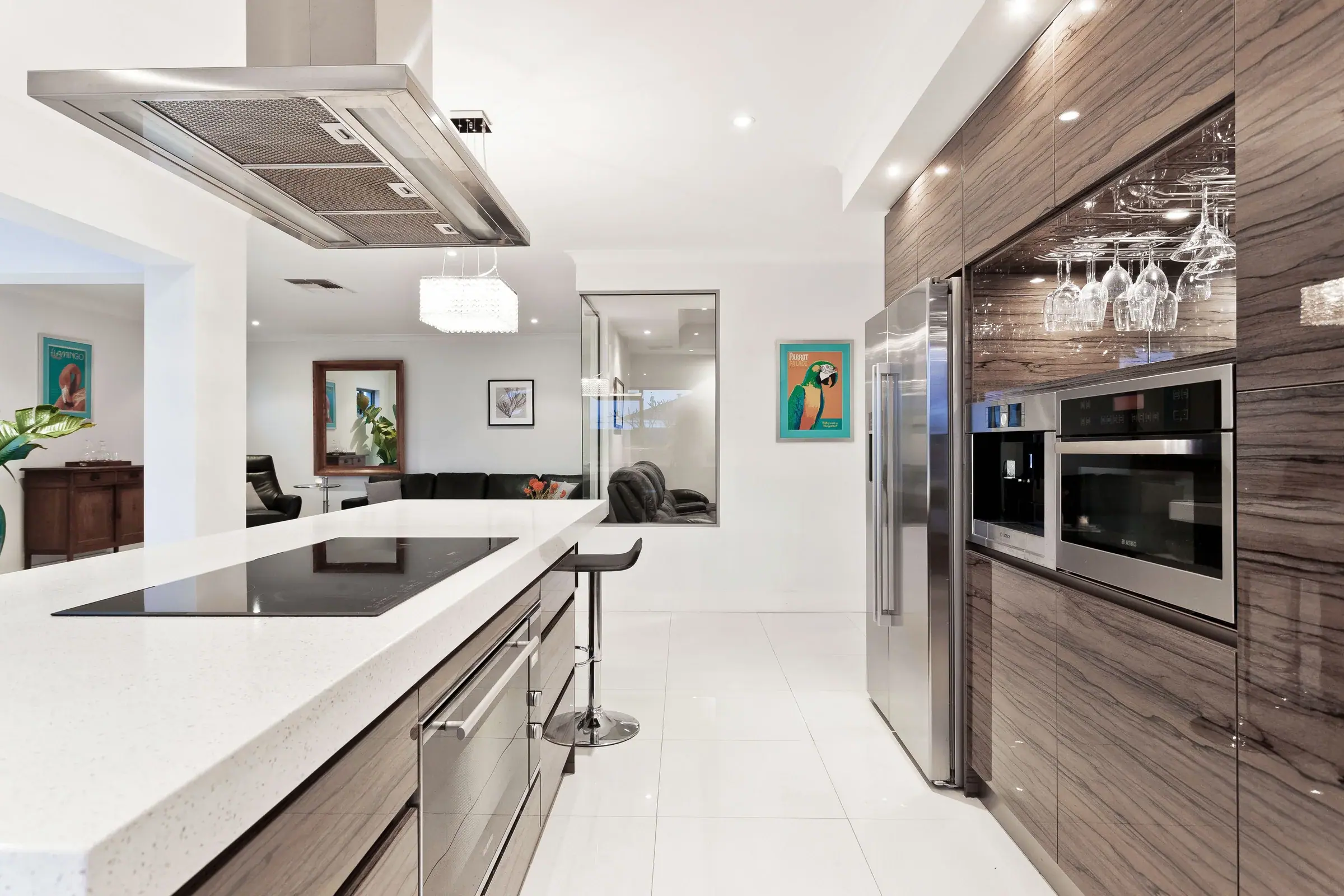 Custom kitchen with island and premium finishes by Lordes Development